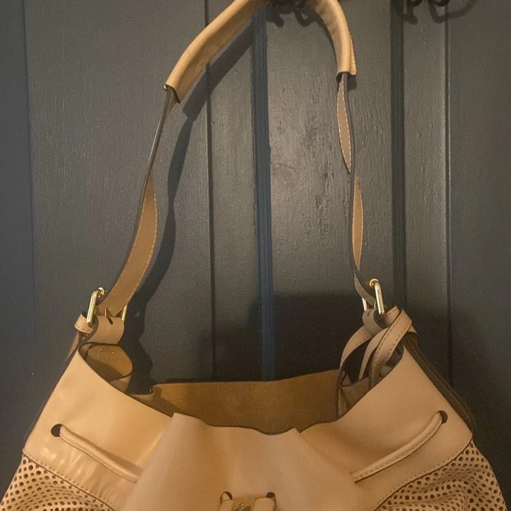 Vince Camuto Sand Perforated Drawstring Hobo Bag with leather pouch